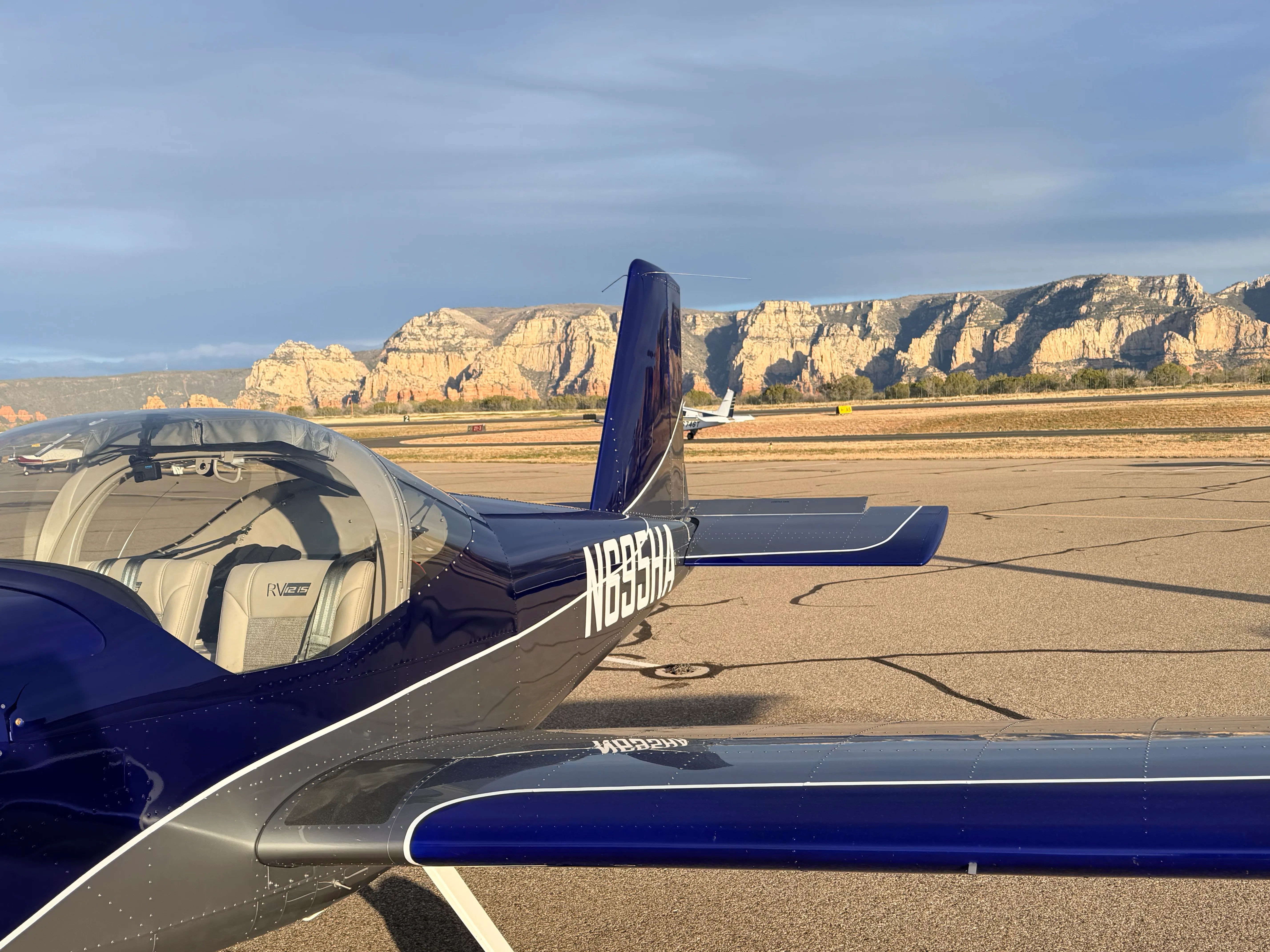 Hawkins Flight Academy RV-12iS (N695HA) side view on the ramp.
