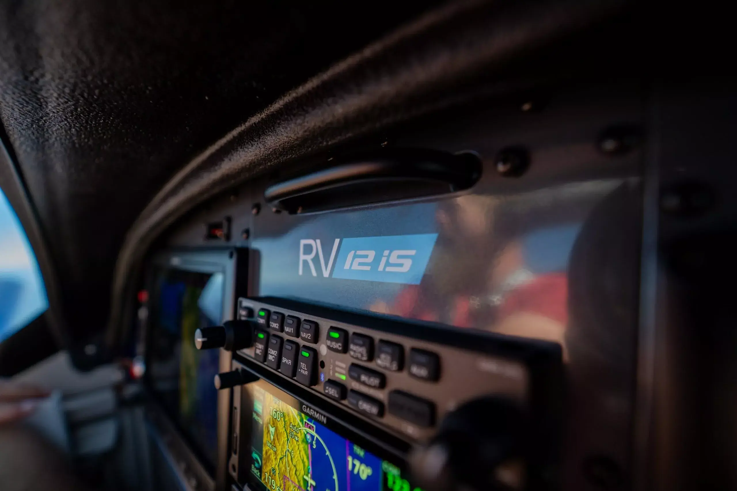 Hawkins Flight Academy RV-12 logo on the N692HA instrument panel.