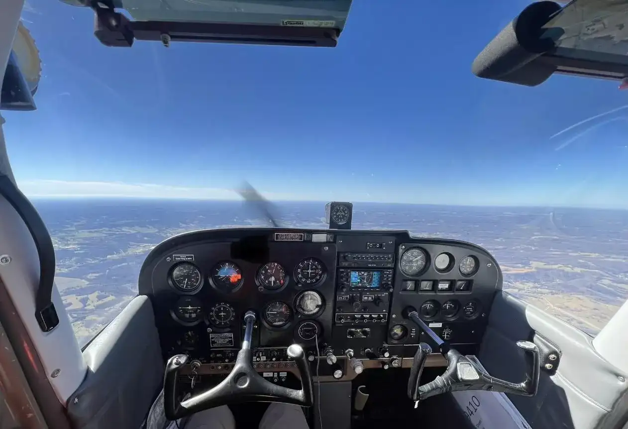 Training aircraft N79410 parked at Hawkins Flight Academy facility