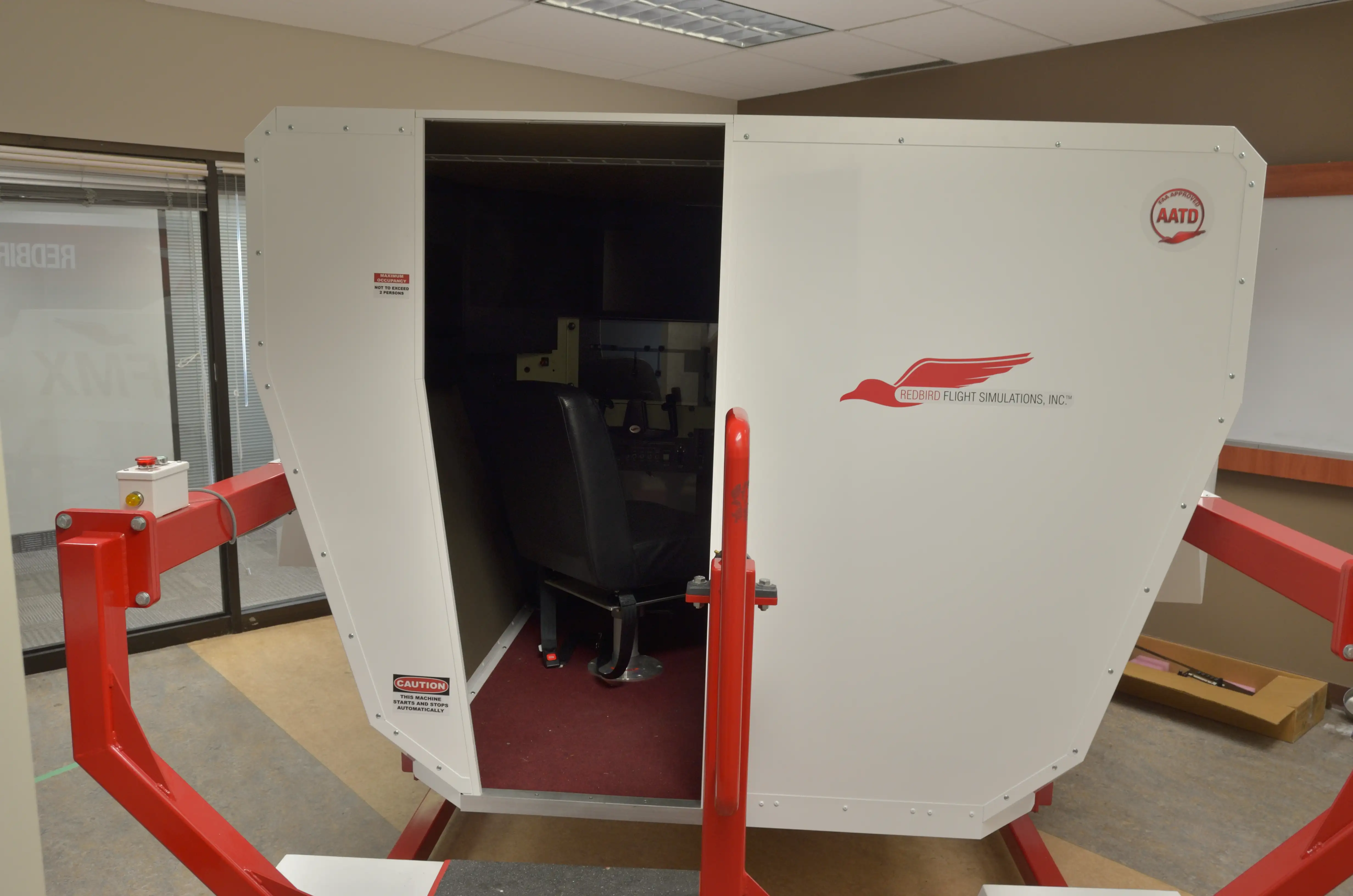 Student practicing in the Redbird flight simulator at Tupelo MS campus