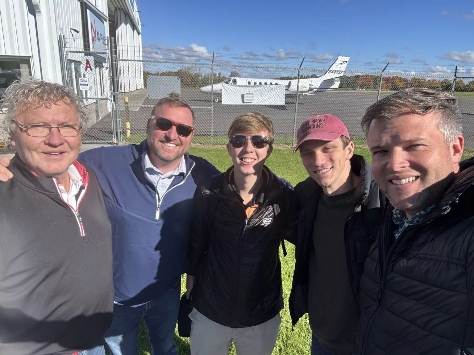 Hawkins Flight Academy students and instructors at the airport preparing for a training flight